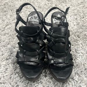 Fergalicious 8 1/2M black man made leather sandal, 4 inch cone heel